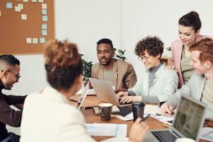 The-Pros-Cons-of-Tracking-Your-Employees-Every-Digital-Movement--scaled.jpg - Onpoint Systems Free Man Wearing Brown Suit Jacket Stock Photo